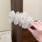 🌸 Barrette coréenne en forme de banane avec du tulle à fleurs