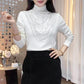 Blouse à manches longues et col montant rembourrée pour femme