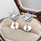 Superbes boucles d'oreilles classiques à six griffes avec diamants