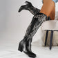 Bottes de cow-boy montant jusqu'aux genoux