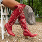Bottes de cow-boy montant jusqu'aux genoux