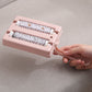 Brosse à tapis à double rouleau, à mai