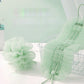 Chiffon exfoliant double face pour le gommage du dos