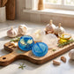 Outil manuel pour tordre, broyer et hacher l'ail