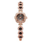 Montre élégante pour femme avec lunette florale ornée de strass