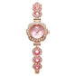 Montre élégante pour femme avec lunette florale ornée de strass