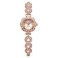 Montre élégante pour femme avec lunette florale ornée de strass